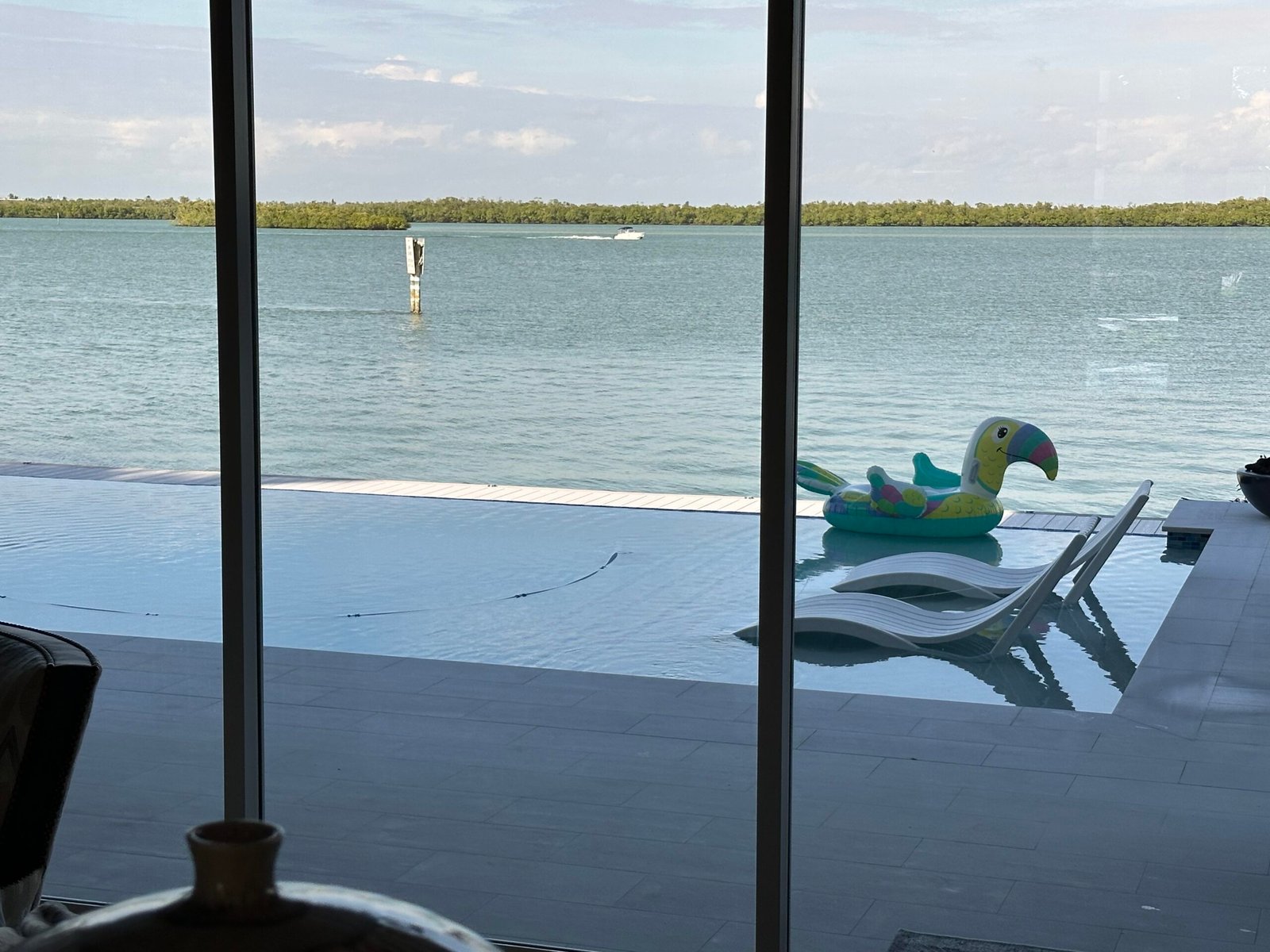 Professional residential window cleaning at a luxury pool home in Marco Island, Florida